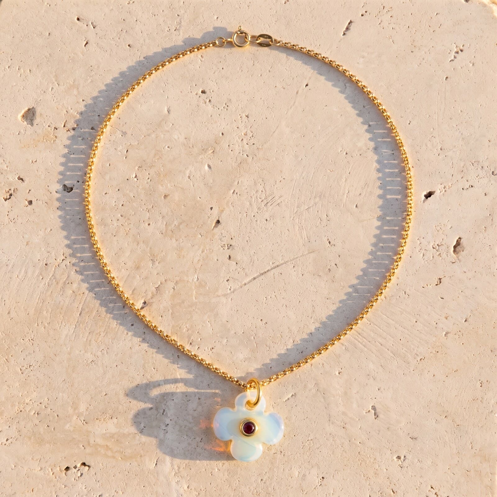 Opalite Clover with Red Crystal Bezel