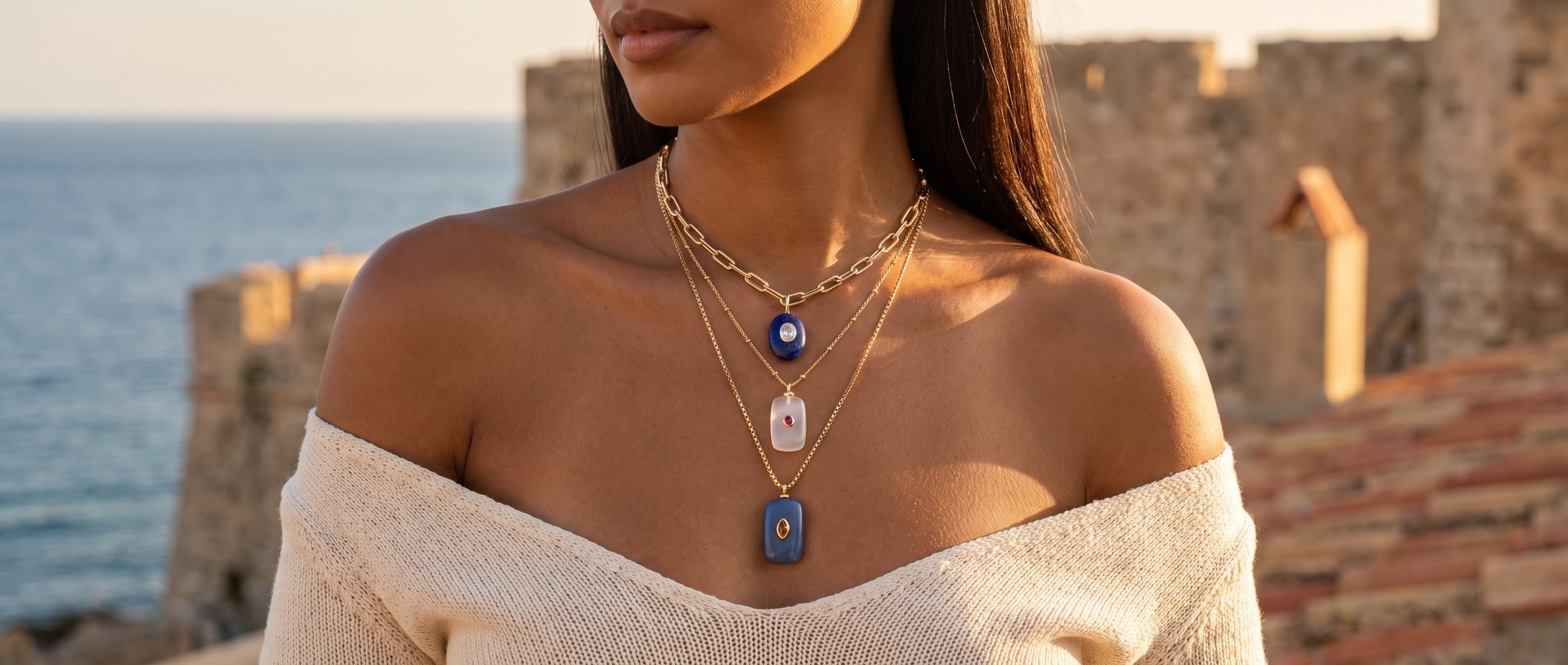 Several J. Ruth pendant necklaces layered together
